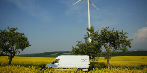Mercedes-Benz Sprinter in front of yellow Rapsfeld on the way to a special ride of euro.COURIER.